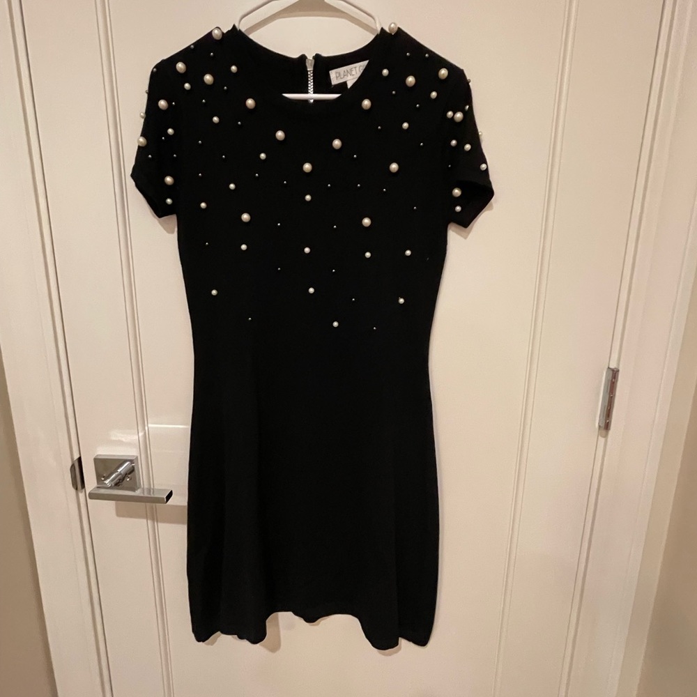 Black Dress with pearls. Above my knee my height is 5’3 and a half.